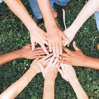 Diverse community members standing together